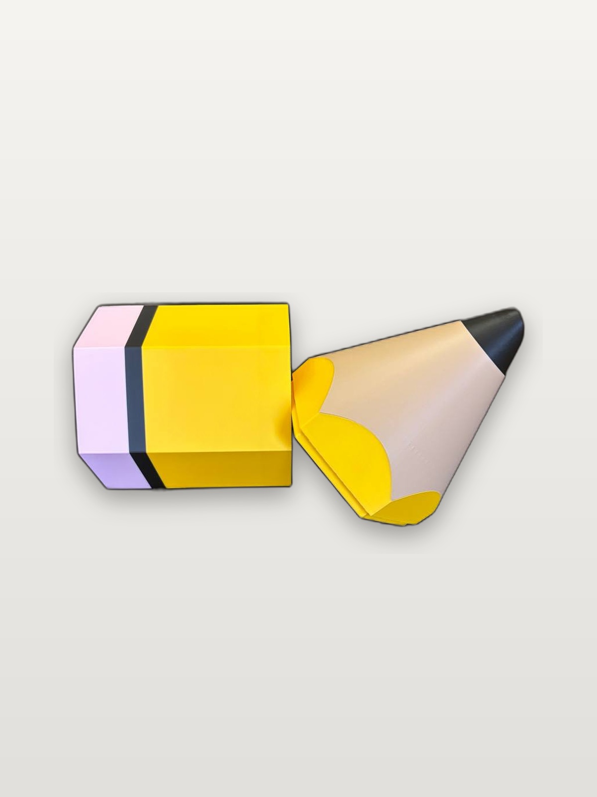 Pencil cup body and pencil lid pieces on a neutral studio background